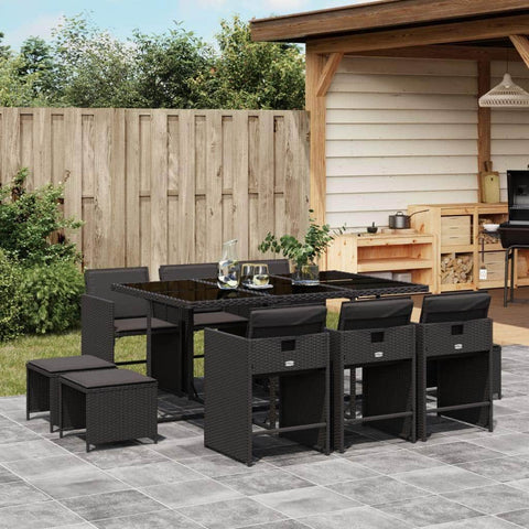 11-Piece Black Poly Rattan Dining Set with Plush Cushions for Outdoor Dining