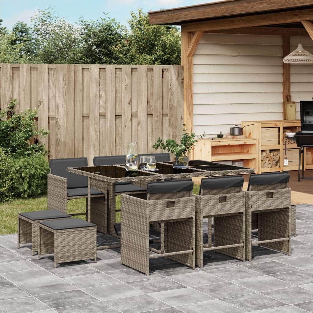 11-Piece Black Poly Rattan Dining Set with Plush Cushions for Outdoor Dining
