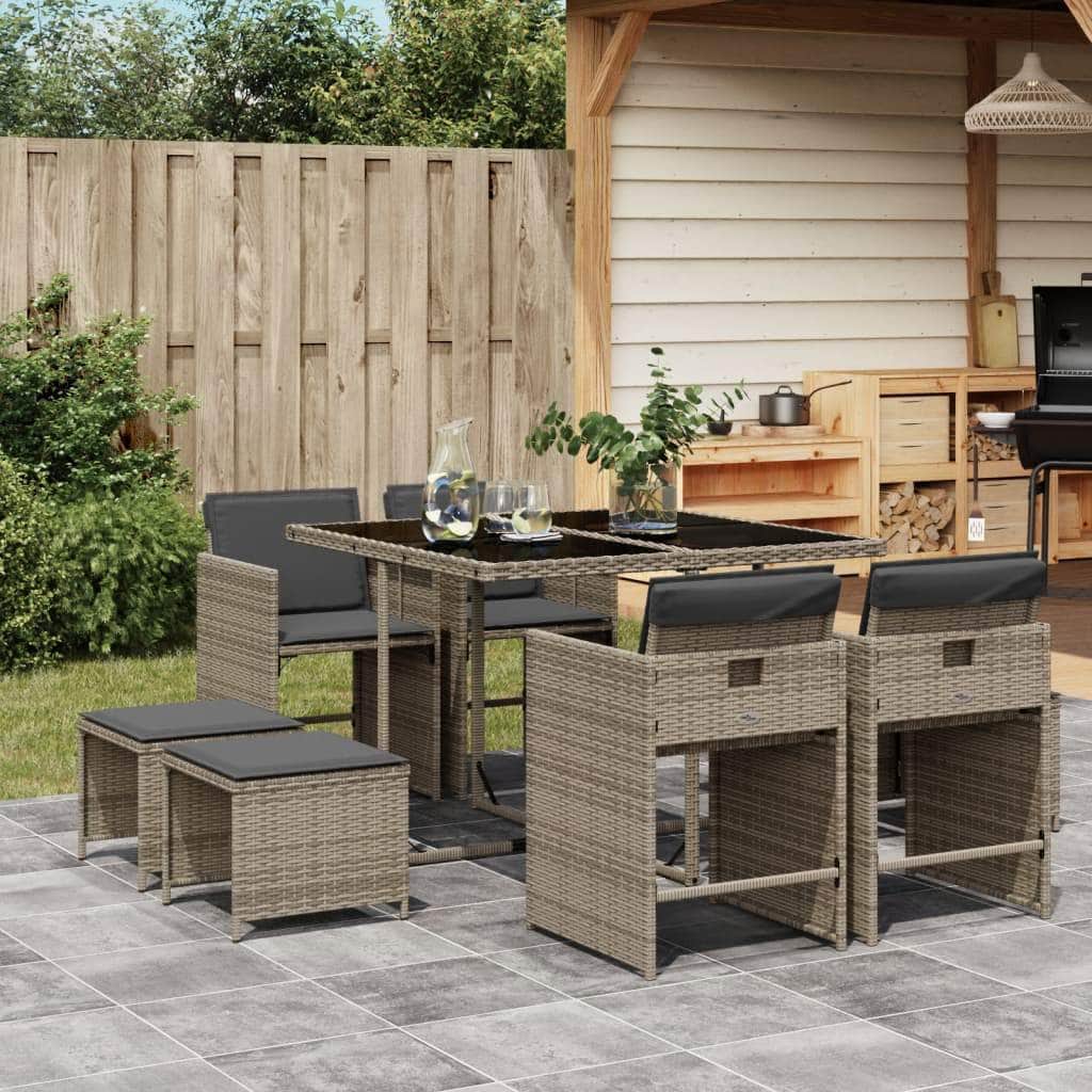 9-Piece Garden Dining Set with Cushions Black Poly Rattan