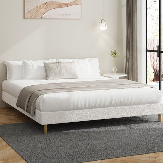 Stylish Bed Base With White Boucle Upholstery
