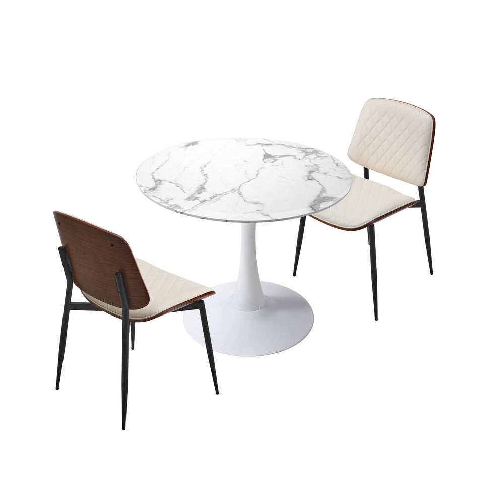 White dining table, in room setting