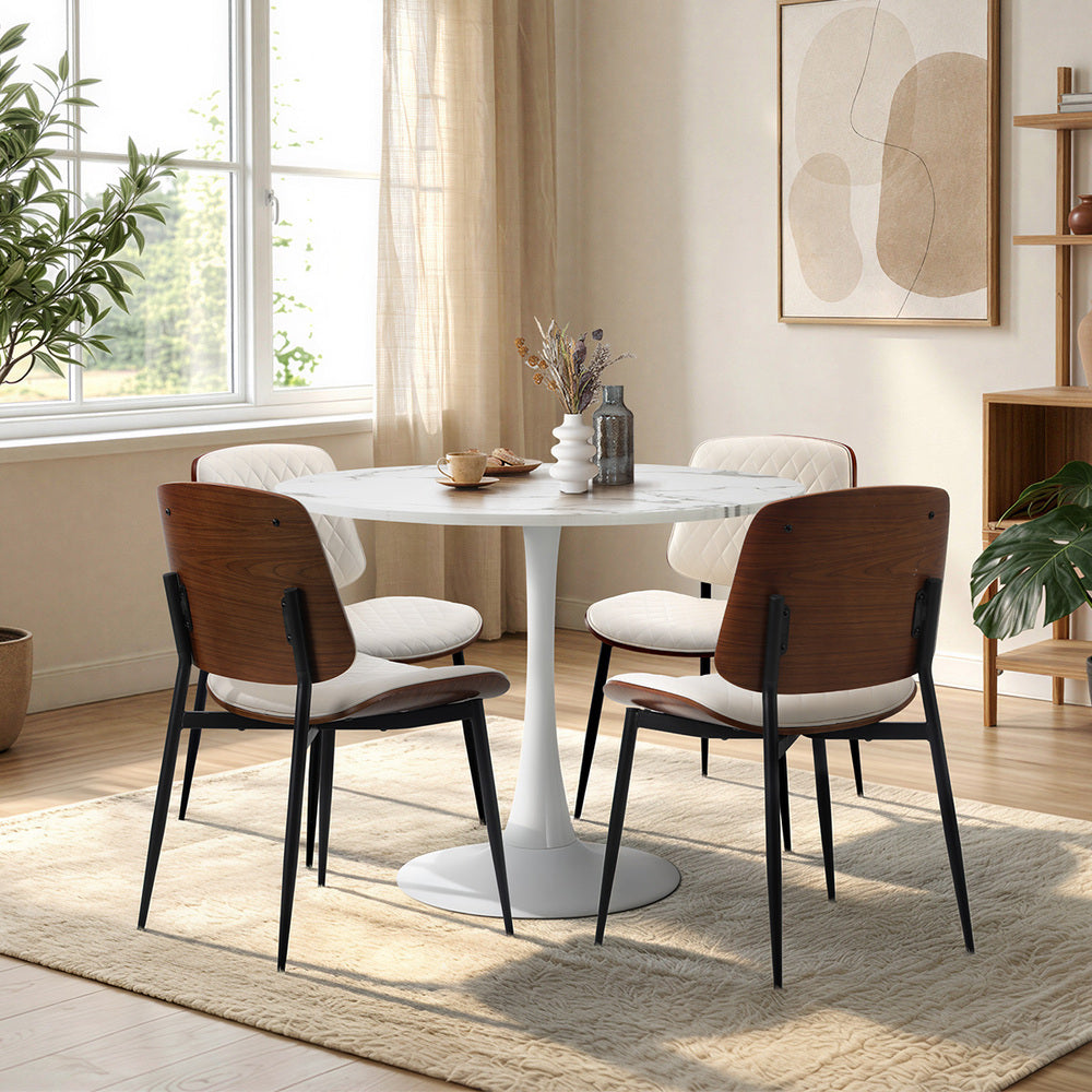White dining table, in room setting