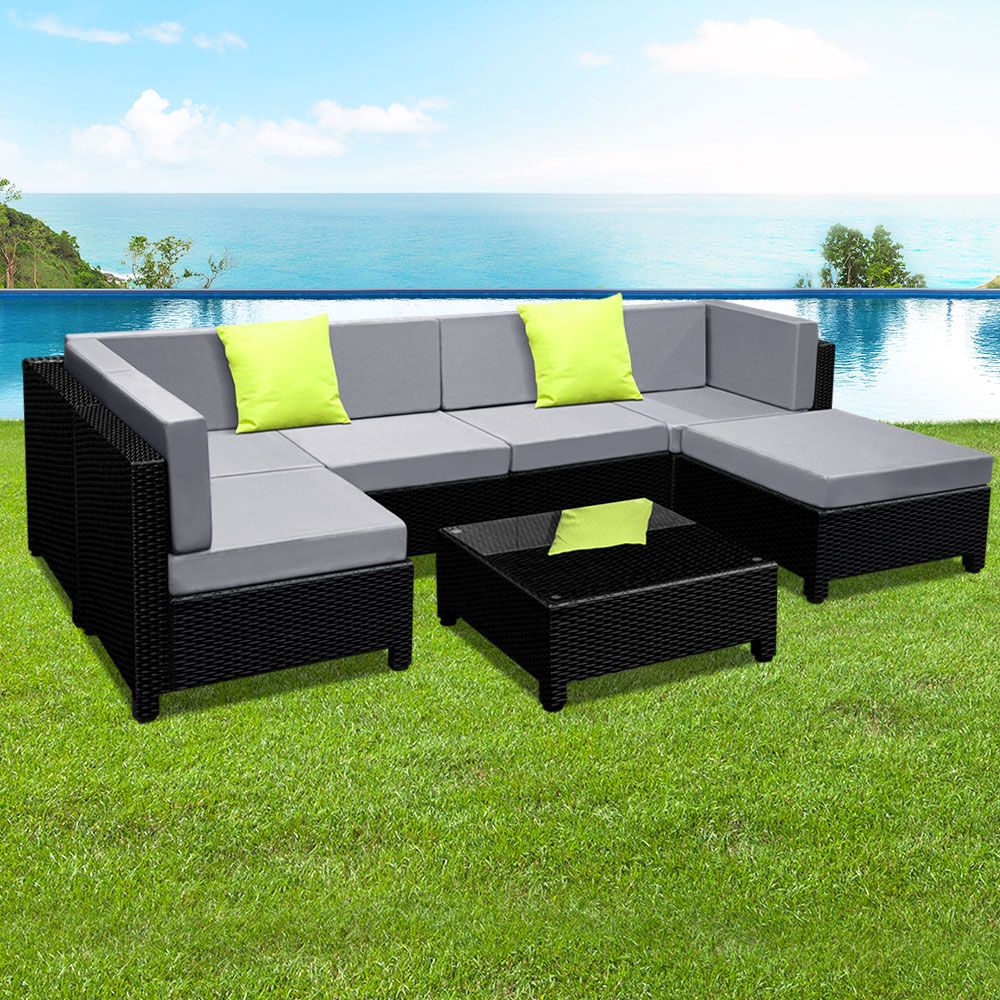7-Piece Wicker Outdoor Sofa Set with Cushions and Seat Covers Included