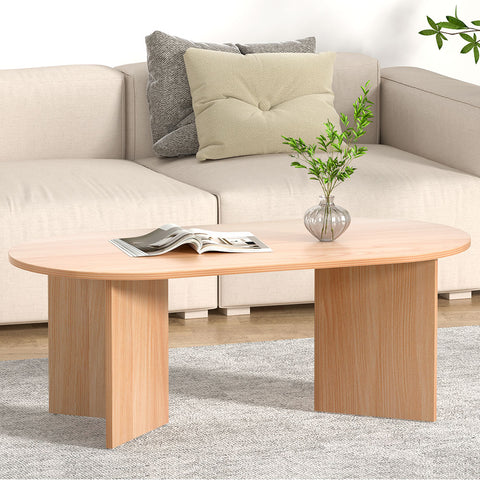 Elegance in Wood Oval Coffee Table for a Stylish Living Room