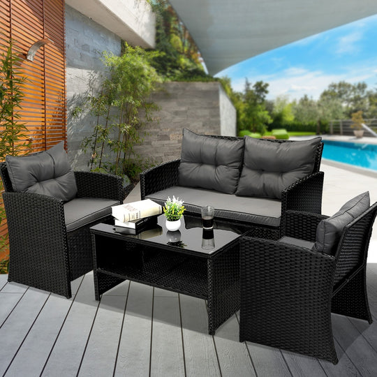 Outdoor Lounge Setting with a 4-Piece Wicker Sofa Chair