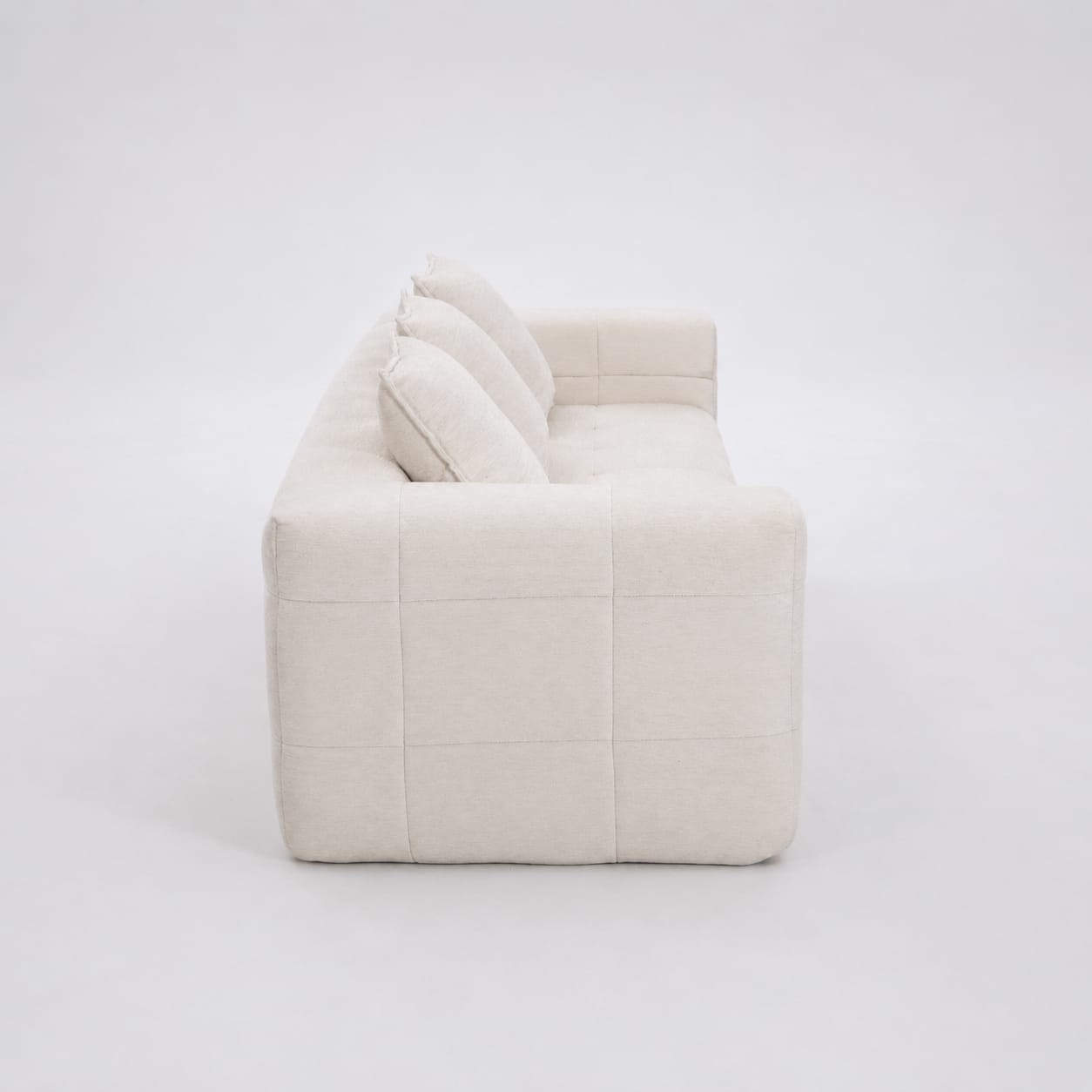 Beige sofa, in room setting