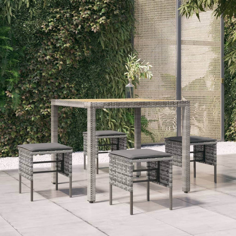 Cosy Oasis: 4-Piece Poly Rattan Garden Footstool Set with Cushions-Black\Grey | Black colour