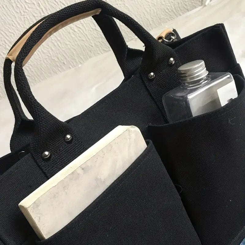 Effortless Travel Companion: Simple Canvas Tote Bag with Wide Strap and Multi Pockets