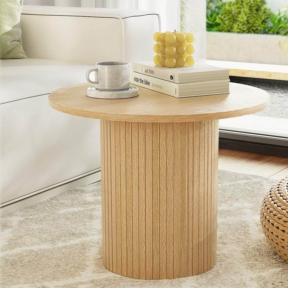 Elegant Round Coffee Table with Fluted Base