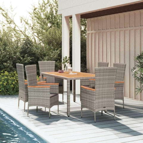 Outdoor Ensemble: 7-Piece Poly Rattan Garden Dining Set in Grey with Cushions