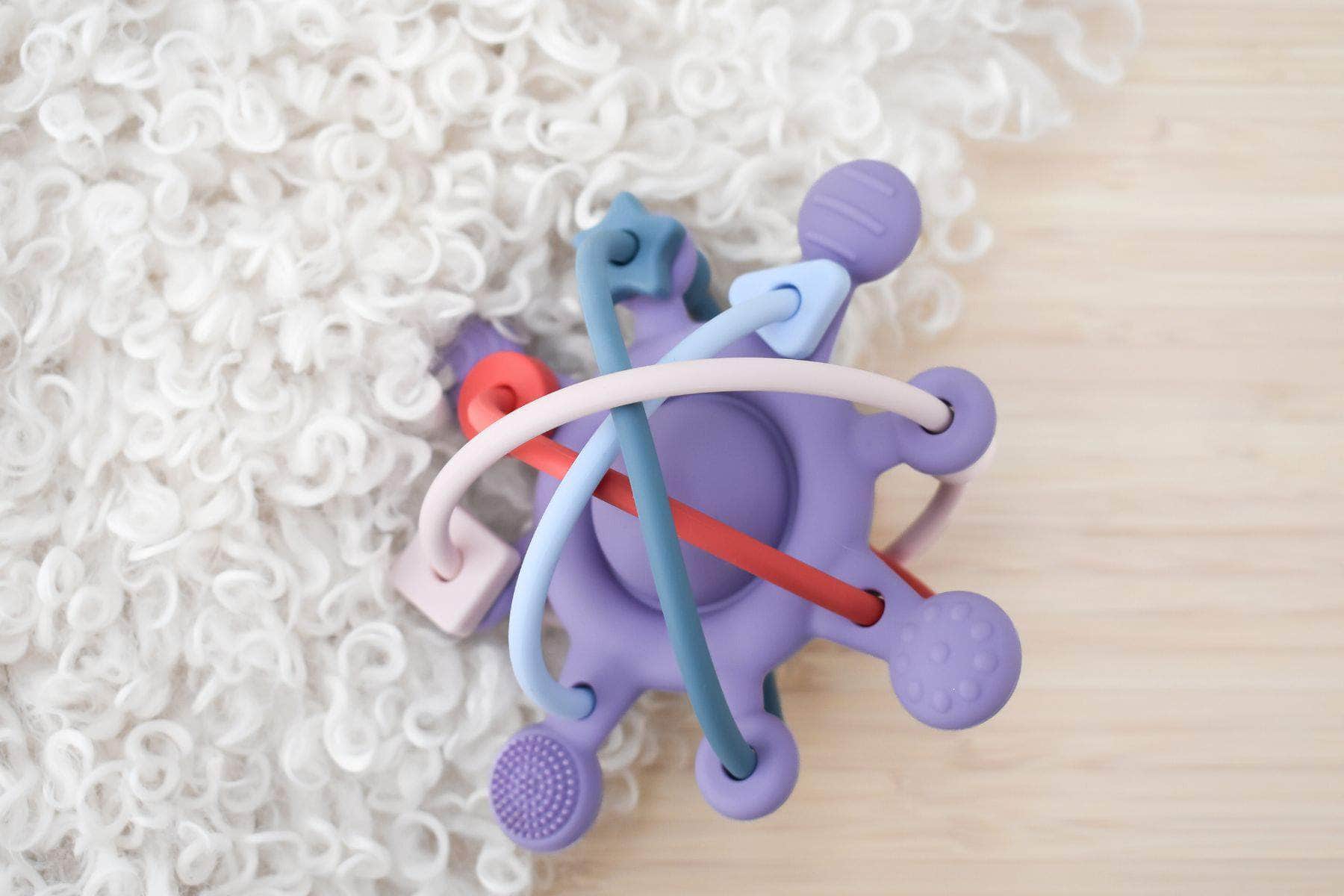 Silicone sensory space rattle teether purple