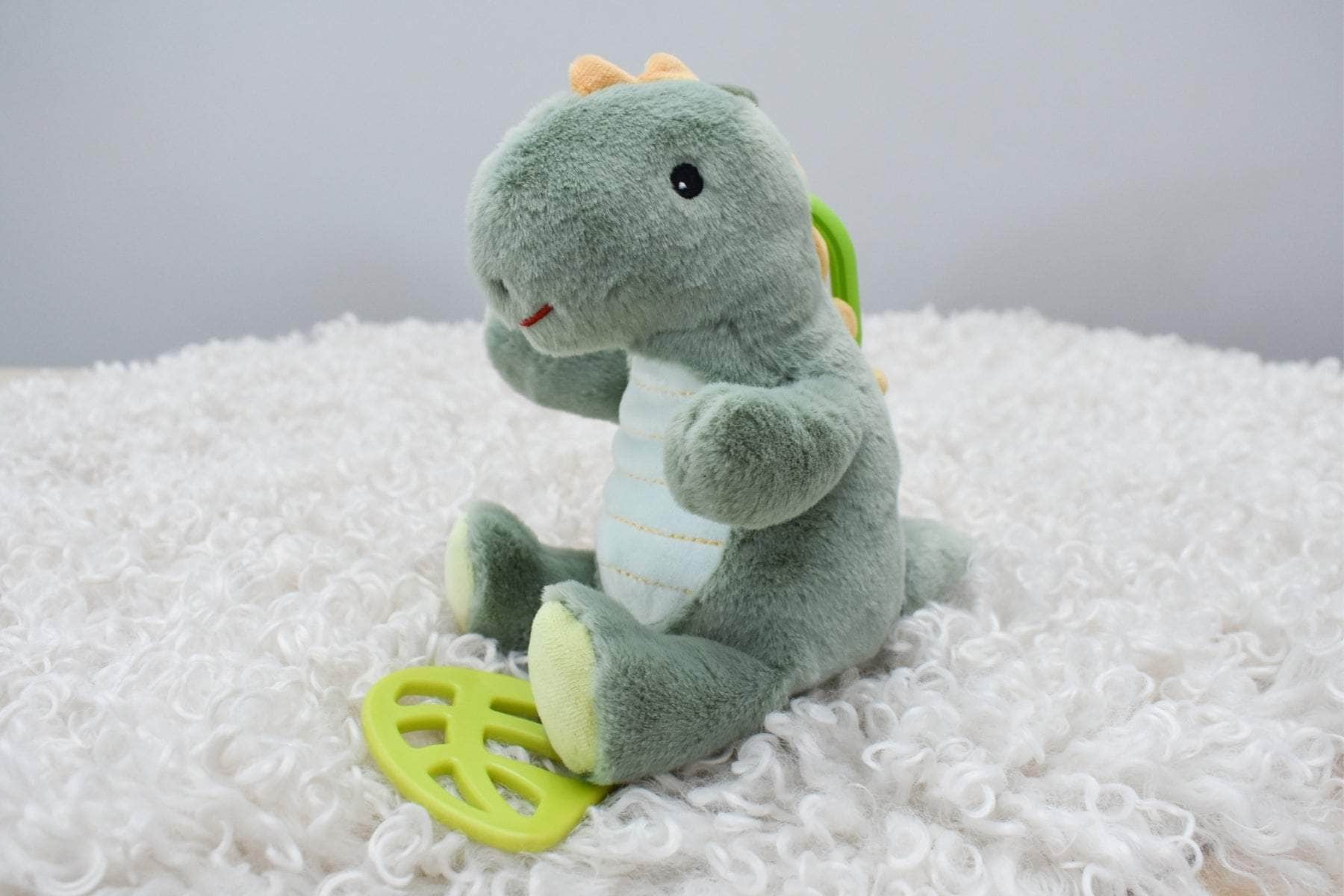 Snuggle buddy minty dinosaur jiggler