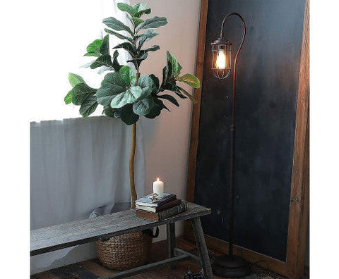 Floor Lamp with Adjustable Cage Shade Rustic in Bronze Finish